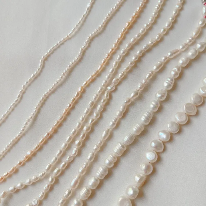 Basra pearl satlada with an old-cut diamond clasp